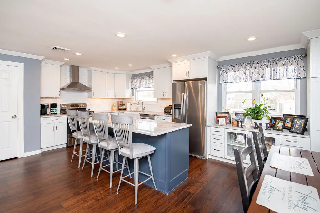 Open concept kitchen remodel with standalone kitchen island