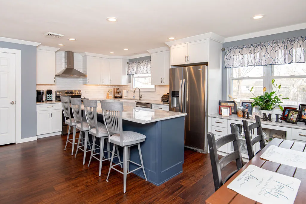 Open concept kitchen remodel with standalone kitchen island
